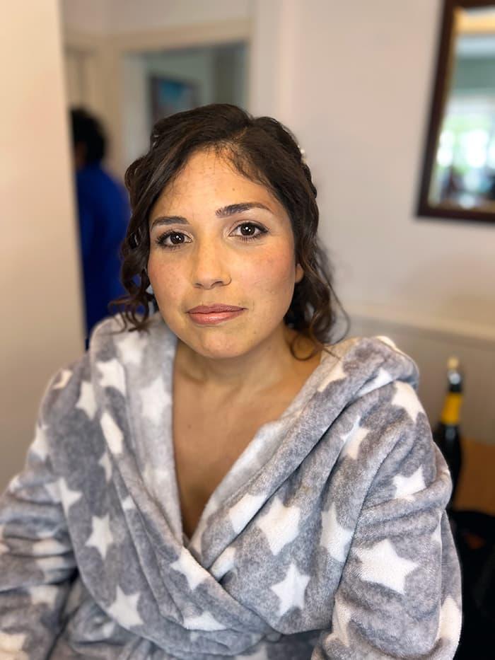 Radiant bridal makeup on client in Winchester