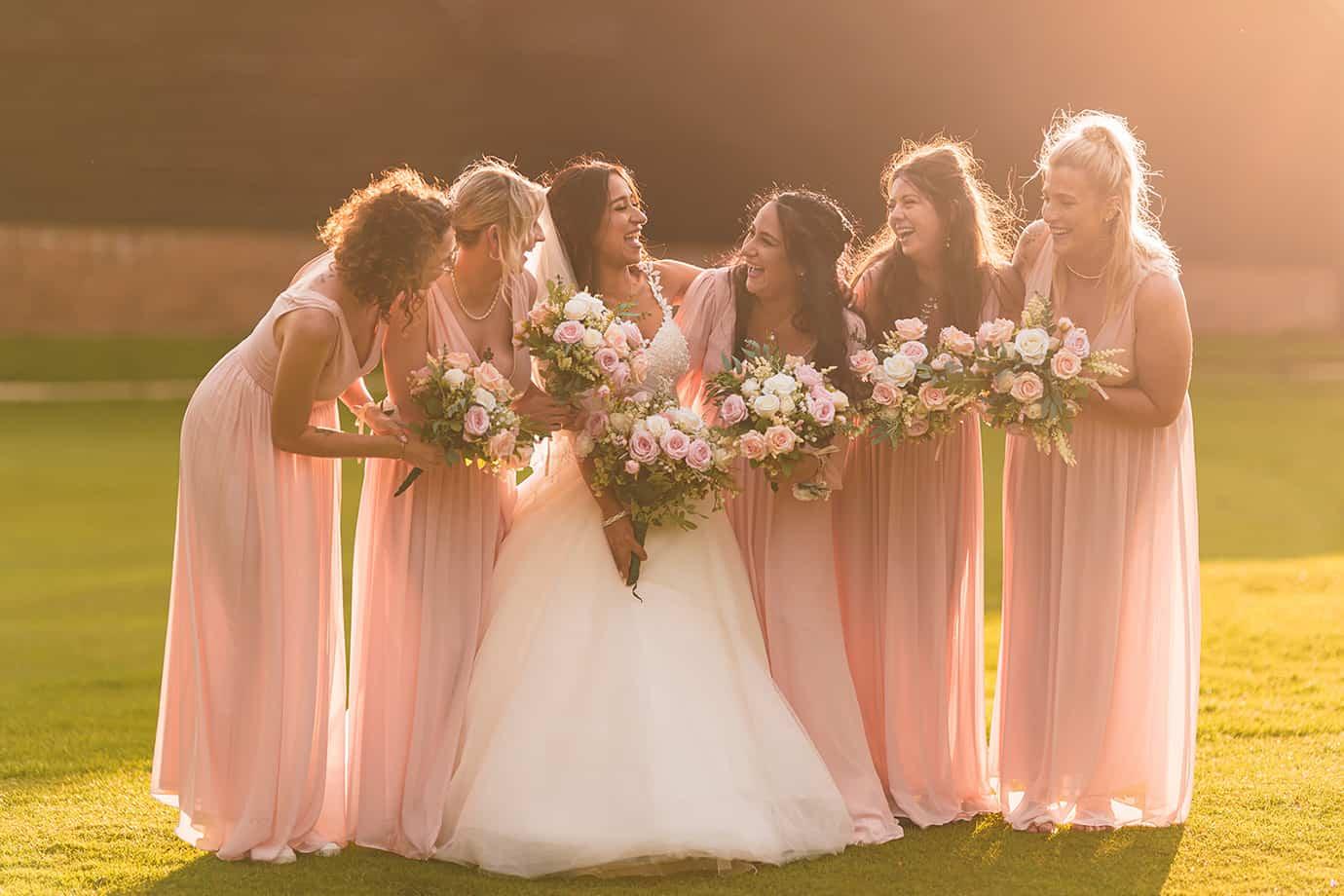 photo of bridesmaids laughing