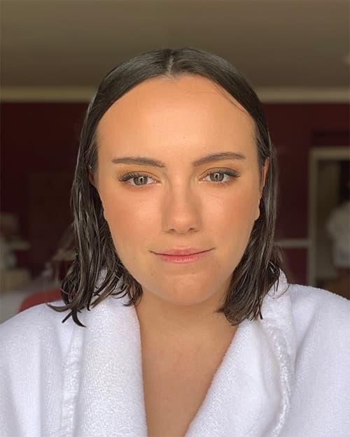 Client after bridesmaid makeup — soft, romantic look with glowing skin