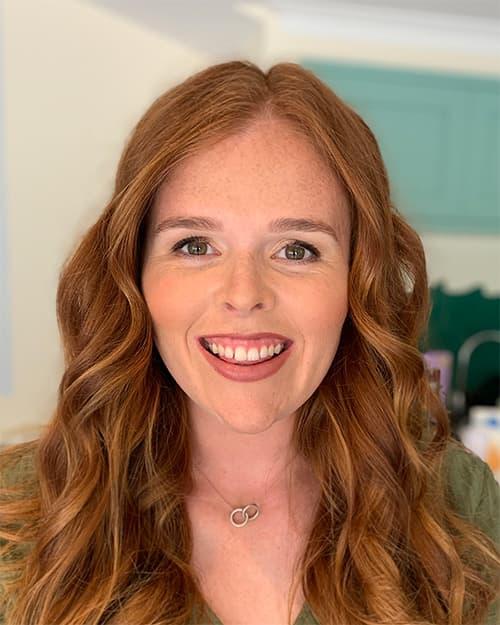 Young woman after bridesmaid makeup — glowing look with shimmer eye and nude lip