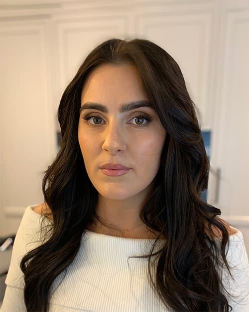 Client after evening makeup — smokey eye and flawless skin